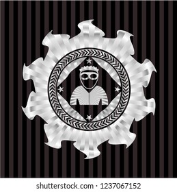 thief icon inside silver badge or emblem
