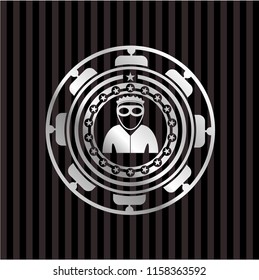 thief icon inside silvery emblem