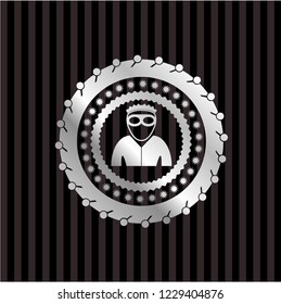 thief icon inside silvery emblem