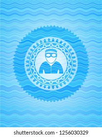 thief icon inside sky blue water wave badge.