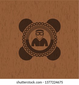 thief icon inside vintage wooden emblem
