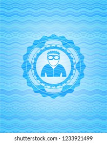 thief icon inside water emblem background.