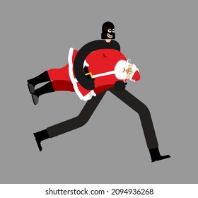 Thief stolen Santa Claus. Burglar Stole grandfather. Criminal carries. New Year is canceled. There will be no holiday