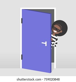 A thief trying to penetrate the house illegaly. Vector female character wearing a black mask peeping out from behind the door. Flat illustration, clip art 