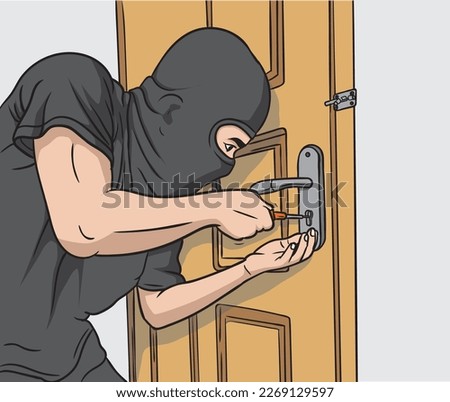 a thief wearing a black mask is trying to break into the door of the house. robbers who are carrying out theft.