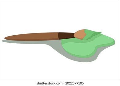 thin brush for drawing in the classroom in green paint on a white background