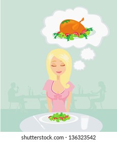 Thin girl is dreaming of a roast chicken