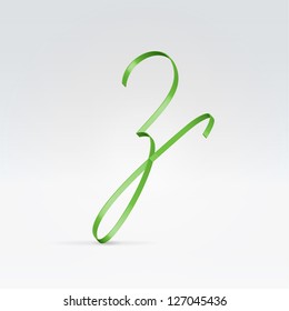 Thin green satin ribbon typeface lowercase z letter hanging over light background