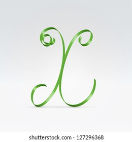 Thin green satin ribbon typeface capital X letter hanging over light background