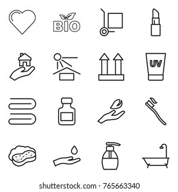 Thin line icon set : heart, bio, cargo stoller, lipstick, real estate, sun potection, top sign, uv cream, towel, pills bottle, hand leaf, tooth brush, sponge with foam, and drop, liquid soap, bath
