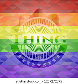 Thing on mosaic background with the colors of the LGBT flag