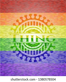 Thing on mosaic background with the colors of the LGBT flag