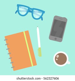 Things on the table from the top. Notebook, phone, glasses etc. 