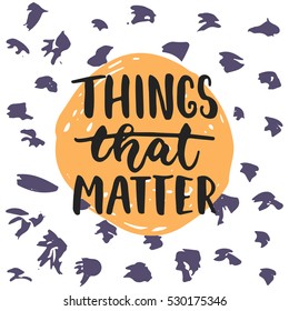 Things that matter - hand drawn lettering phrase isolated on the polka dot grunge background. Fun brush ink inscription for photo overlays, greeting card or t-shirt print, poster design.