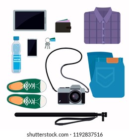 Things that people take with them on a trip jeans shoes purse camera shirt and other.