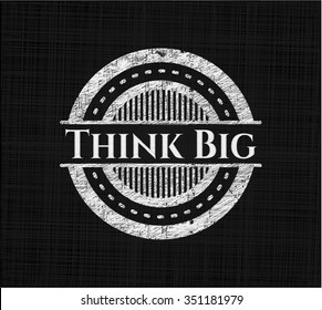 Think Big chalk emblem written on a blackboard