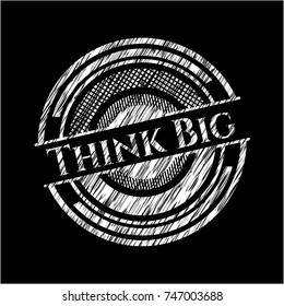Think Big chalk emblem written on a blackboard