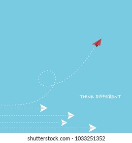 Think different, a red paper plane flying different way from white paper planes. Business concept minimalist style.