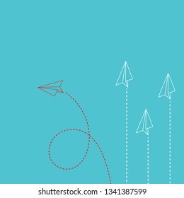 Think differently concept. Red airplane changing direction. New idea, change, trend, courage, creative solution, innovation and unique way concept.