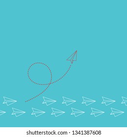 Think differently concept. Red airplane changing direction. New idea, change, trend, courage, creative solution, innovation and unique way concept.