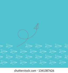 Think differently concept. Red airplane changing direction. New idea, change, trend, courage, creative solution, innovation and unique way concept.