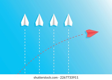 Think differently concept. Red paper airplane changing direction.