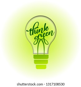 Think Green. Light bulb paper cut layout. Paper art concept.Colorful carving art.