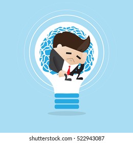 Thinking businessman in light bulb