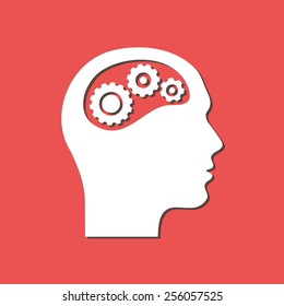Thinking icon.  Silhouette of gear in head 
