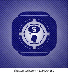 thinking in money icon inside badge with jean texture