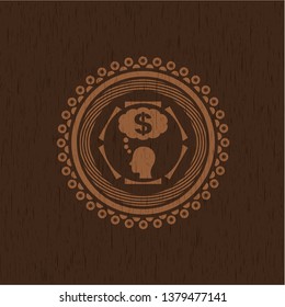thinking in money icon inside badge with wooden background