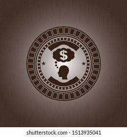 thinking in money icon inside badge with wood background