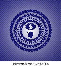 thinking in money icon inside emblem with denim high quality background