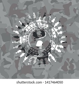 thinking in money icon inside grey camouflage texture