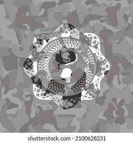 thinking in money icon inside grey camouflage emblem. 