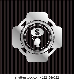 thinking in money icon inside silvery badge or emblem