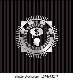 thinking in money icon inside silvery emblem or badge