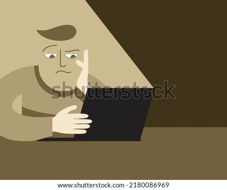 Thinking person in dismay sitting at the table with laptop