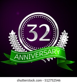 Thirty two years anniversary celebration with silver ring and ribbon.