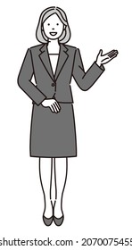 Esta es una ilustración de cuerpo completo en blanco y negro de una mujer de negocios que da indicaciones. Son datos vectoriales fáciles de editar.