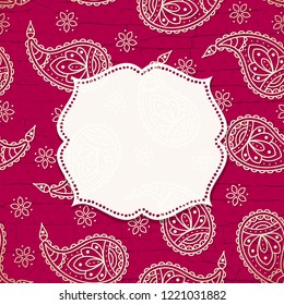 This is a bright paisley background with a frame in 
Indian slile. Vector illustration.