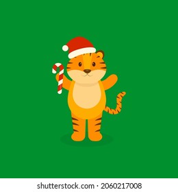  This is a card with a cute tiger on a green background. Vector winter illustration.
