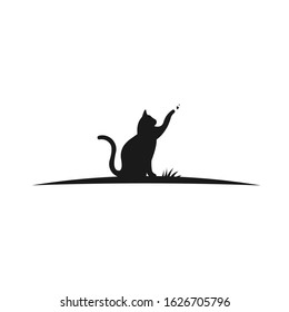 this is a cat and a butterfly playing