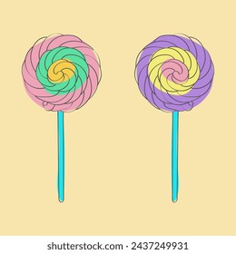 This is a close-up view of two colorful lollipops placed on top of each other playfully and whimsically