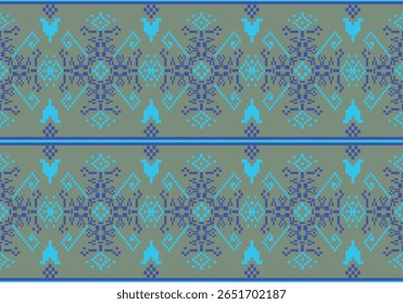Este diseño muestra un patrón de píxeles simétricos en tonos azules fríos sobre un fondo verde apagado. Los motivos se asemejan a pájaros y flores estilizadas, dándole una apariencia serena inspirada en el arte popular.
