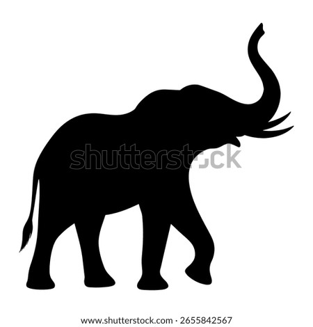 This elephant shows a happy elephant with its trunk up high. The elephant is lifting its trunk in the air like it's celebrating. You can see the elephant's big body and large ears clearly