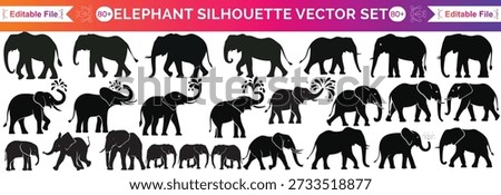 This elephant shows a happy elephant with its trunk up high. The elephant is lifting its trunk in the air like it's celebrating. You can see the elephant's big body and large ears clearly