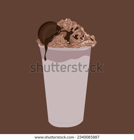 This enticing image features a delicious cup of creamy drink paired with a selection of fresh, crispy biscuits. 