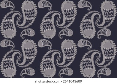 This fabric features a repeating paisley pattern in soft lavender tones on a dark black background, creating a classic and elegant textile design.