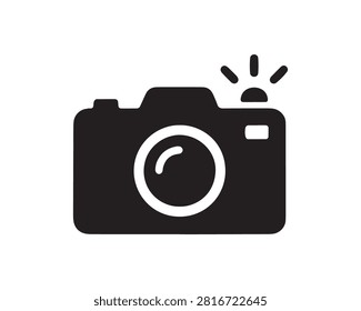 This is a flat icon depicting a black camera silhouette with a flash, set against a white background. The distinctive silhouette style makes it ideal for digital use and graphic design projects.